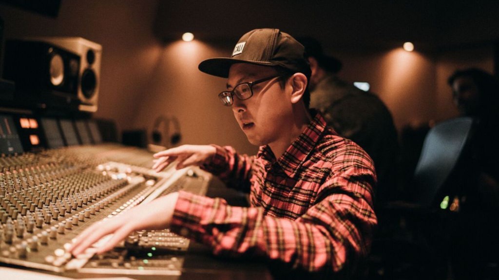 Matthew Sim at the mixing console